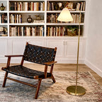 Majestic Brass Ring Base Curved Floor Lamp With Triangle White Drum Sh