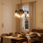 6-Light Modern Farmhouse Black Chandelier styled in a warm modern interior