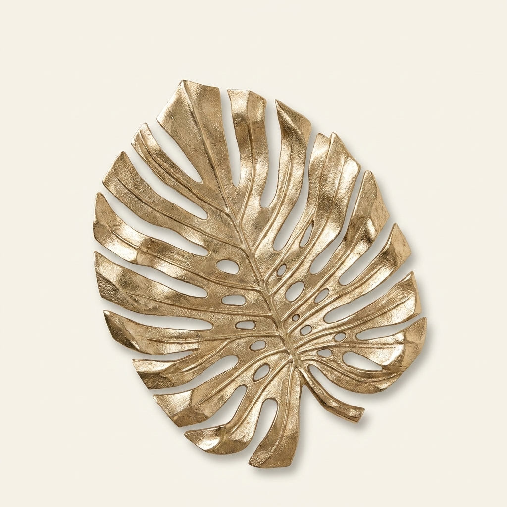 18.9x13.4x1.4 Gold Monstera Leaf Wall DEcor on a warm cream background