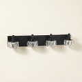 Modern 4-Light Matte Black LED Vanity Light Fixture With Crystal Glass on a warm cream background