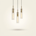Gold Pendant Light Fixtures on a warm cream background
