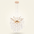 Modern Tree Branch Crystal Chandelier Luxury Gold Crystal Pendant Ligh on a warm cream background