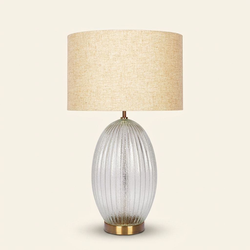 Aurora Ribbed Glass Lamp Base Clear Table Lamp Large Linen Shade on a warm cream background